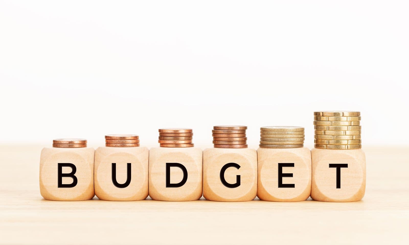 budget-word-on-wooden-blocks-and-coins-on-table-2026-01-08-06-00-26-utc (2).jpg